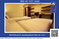 Bed by city hotel